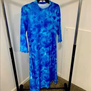 Size medium midi length swim dress. NWOT.